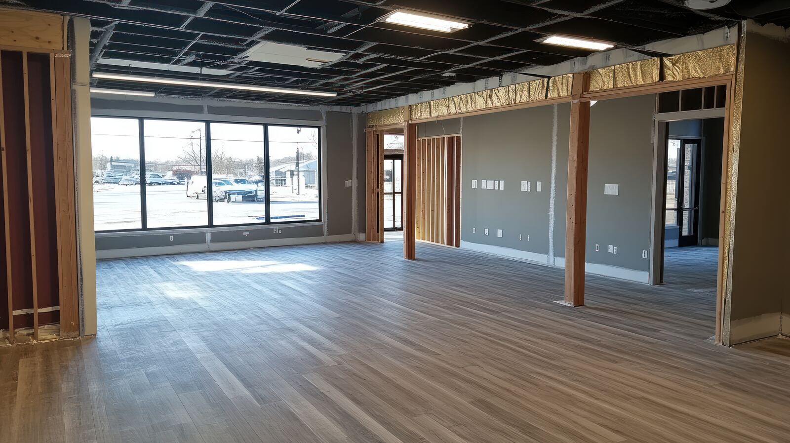Wood framing for new walls and openings inside a commercial space
