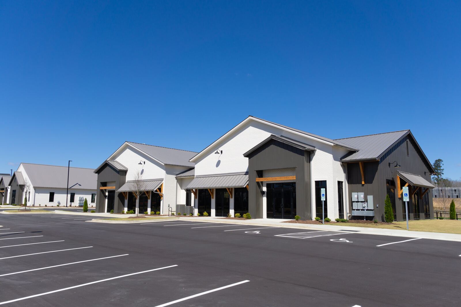 Modern commercial building with new parking lot